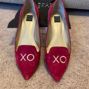 Pink suede “XO” flats